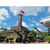 Hanoi flagpole with a huge Vietnam flag seen from the museum.